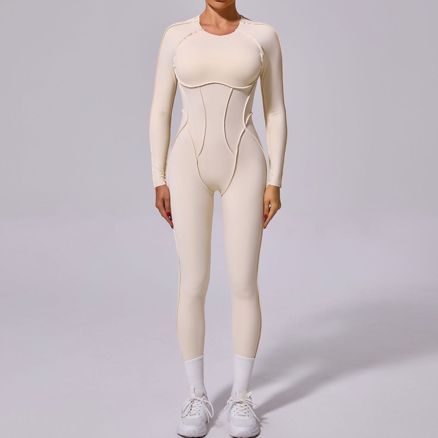 Mono deportivo de yoga de una pieza de otoño e invierno con espalda descubierta y pantalones ajustados de manga larga.