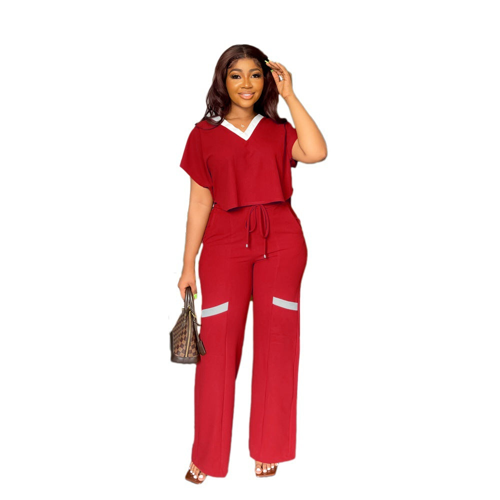 Conjunto deportivo de dos piezas de camiseta de manga corta informal de color liso con pantalones de pierna recta para verano