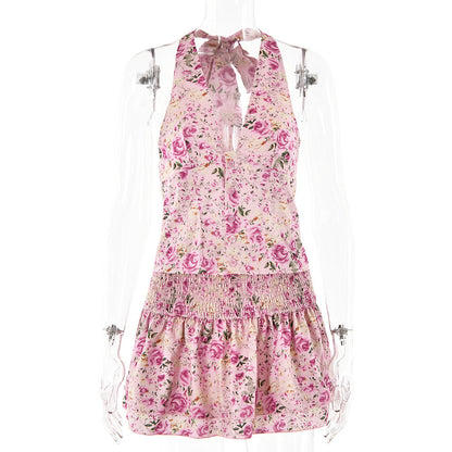 Conjunto de dos piezas formado por top y falda floral, cuello en V, espalda descubierta y falda sexy