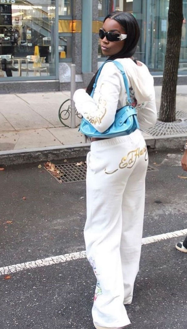 Conjunto de dos piezas para mujer, cárdigan corto básico con cremallera y estampado de calavera y corazón de Brand Street, pantalones rectos de cintura alta