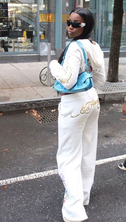 Conjunto de dos piezas para mujer, cárdigan corto básico con cremallera y estampado de calavera y corazón de Brand Street, pantalones rectos de cintura alta
