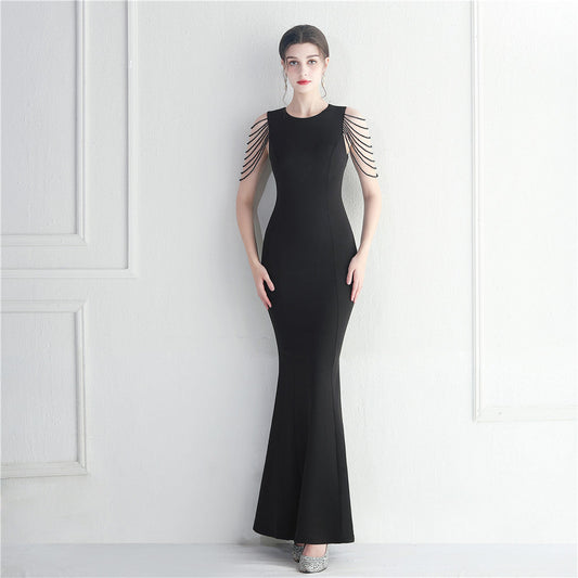Vestido largo de cola de pez con cuentas para dama de honor invitada a la boda