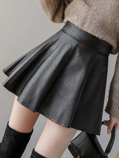 Falda plisada de PU para mujer, falda de cuero de color liso para otoño e invierno, ajustada, de cintura alta, con cremallera, elegante