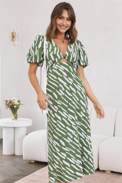 Vestido midi con abertura y escote en V, mangas abullonadas y estampado 