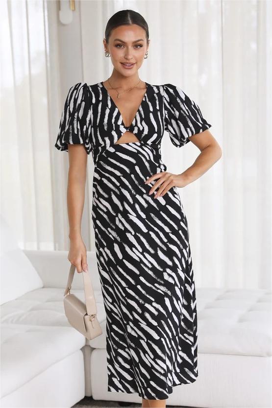 Vestido midi con abertura y escote en V, mangas abullonadas y estampado 