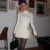 Elegante minivestido de punto con mangas acampanadas para mujer, estilo vintage, liso, cuello alto, ajustado, plisado, corto, para otoño, elegante, de punto