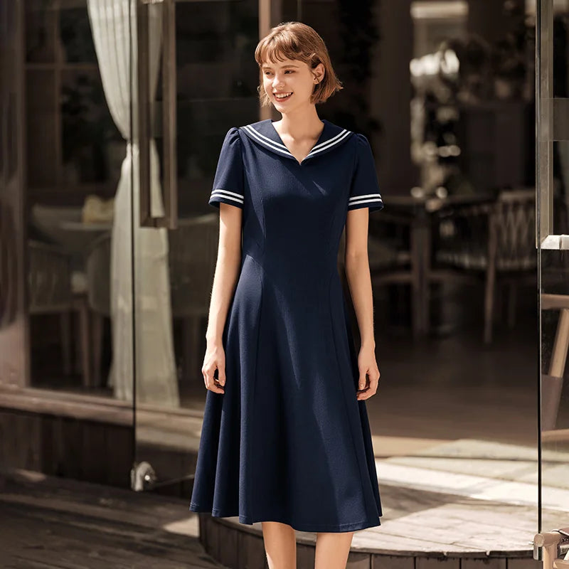 Vestido de mujer con cuello azul marino y estilo universitario y artístico, nuevo vestido de verano blanco con luz de luna y cintura ceñida.