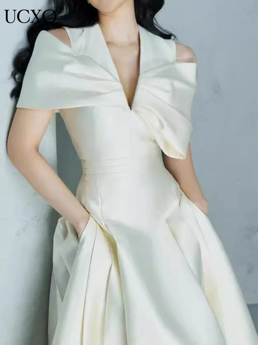Elegante vestido largo estilo hada, escote en V, cintura hueca, lazo 3D, bolsillo, vestidos de fiesta de moda para mujer, primavera-verano 2025, 23A9338