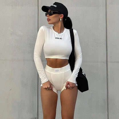 Conjunto deportivo versátil de dos piezas de manga corta, cuello redondo, pantalones cortos 3/4 y estilo europeo y americano para primavera/verano para mujer