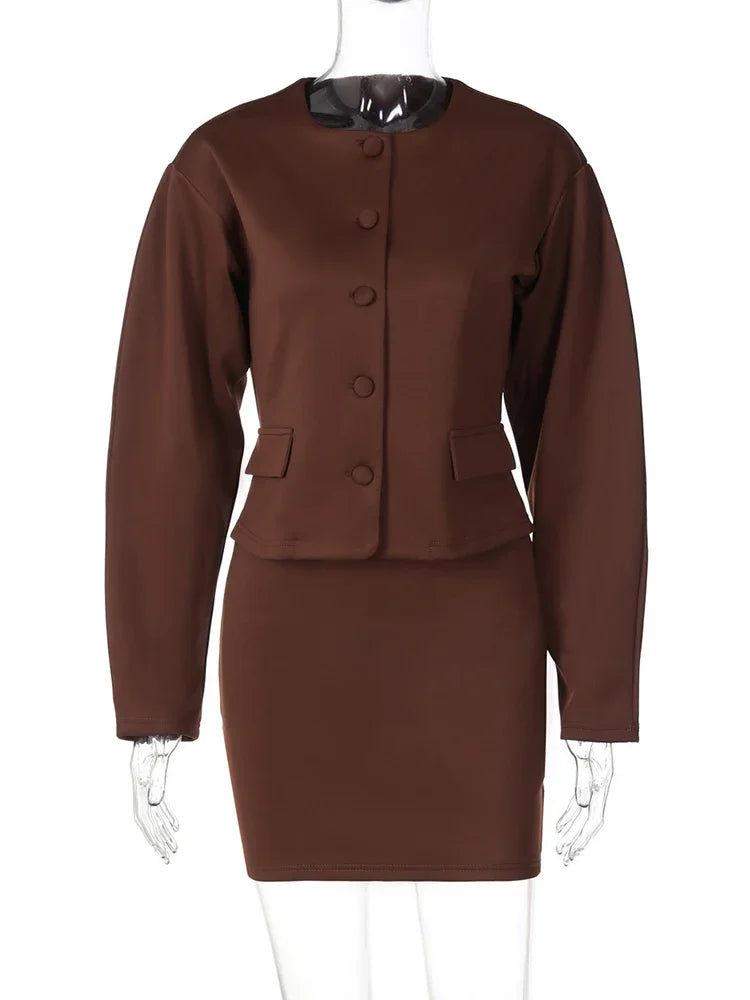 Conjunto de dos piezas de falda y cárdigan de moda para mujer, top de manga larga con botones, minifalda ajustada de color liso, conjunto elegante a juego para otoño e invierno.