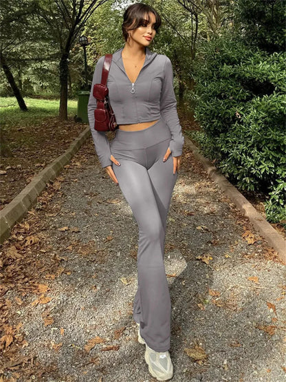 Conjunto informal de invierno de dos piezas con cárdigan de pierna recta y cremallera para mujer, y chándal ajustado de cintura alta con pantalones para mujer.