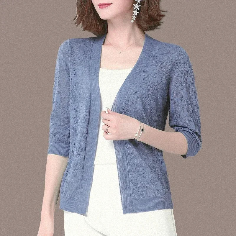 Suéter tipo cárdigan de encaje calado sexy con protección solar para mujer, suéter de punto holgado y ancho con aire acondicionado, sección delgada para primavera y otoño.
