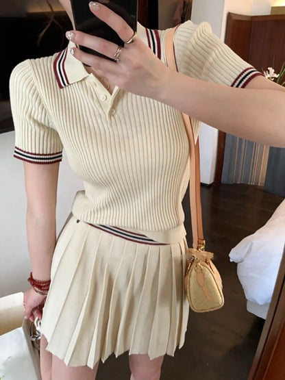 Conjunto de falda de punto de dos piezas para mujer, top de manga corta con cuello vuelto y minifalda plisada, moda coreana, otoño