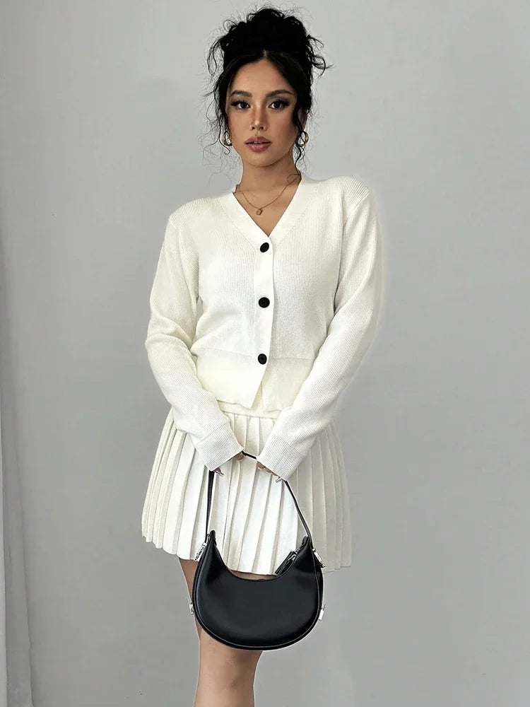 Conjunto de dos piezas de suéter de punto retro de manga larga con falda plisada de cintura alta para mujer, conjuntos sólidos a juego de nicho, otoño nuevo