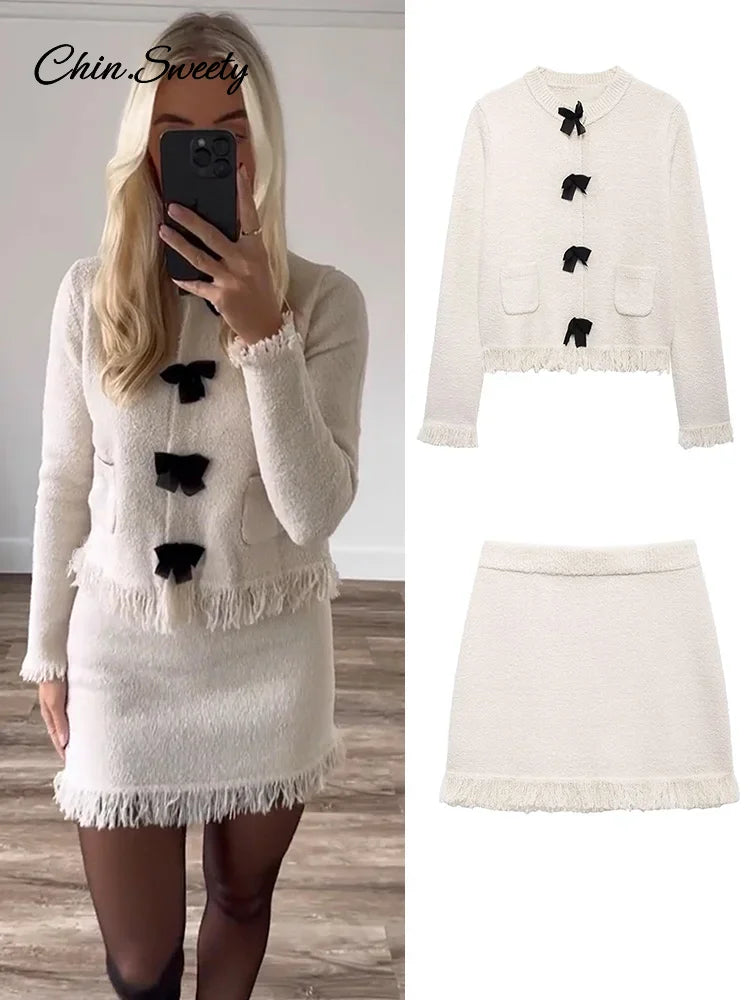 Conjunto de falda de punto con borlas de moda para mujer, cárdigan de manga larga con cuello redondo y hebilla de lazo, suéter y minifalda, nuevo conjunto a juego.
