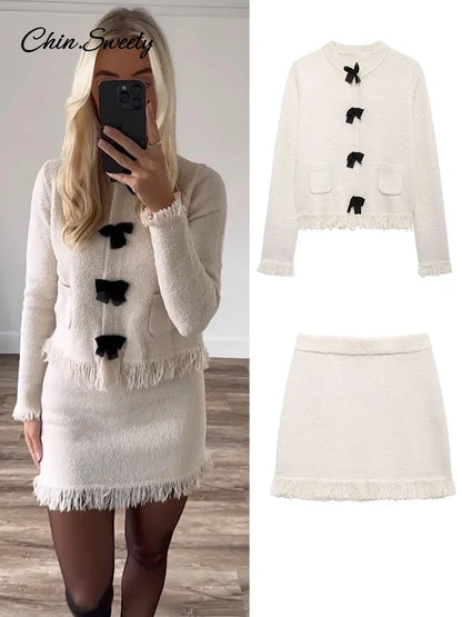 Conjunto de falda de punto con borlas de moda para mujer, cárdigan de manga larga con cuello redondo y hebilla de lazo, suéter y minifalda, nuevo conjunto a juego.