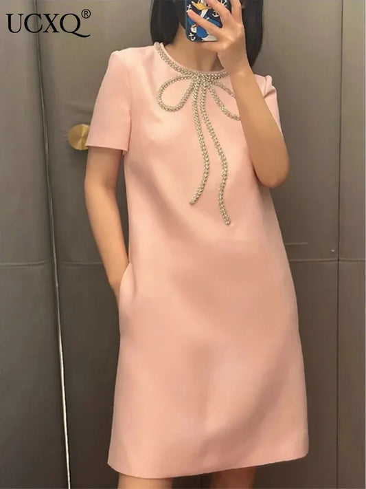 Vestido corto de moda Hotsweet con lazo de cuentas de diamantes, color liso, cuello redondo, elegante, corte A, para mujer, primavera-verano 2025, 23A9653
