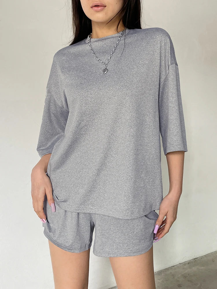 Conjunto de 2 piezas de camiseta y pantalones cortos informales, holgados, básicos, de media manga, color gris liso, con cuello redondo, para mujer, ropa de hogar informal