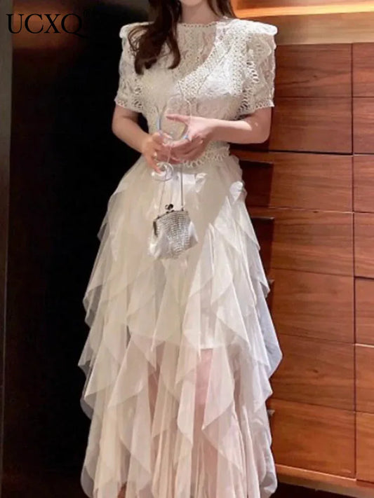 Vestido coreano de encaje con cuello redondo y retazos calados, elegante vestido blanco de malla irregular para mujer, primavera-verano 2025, A7893