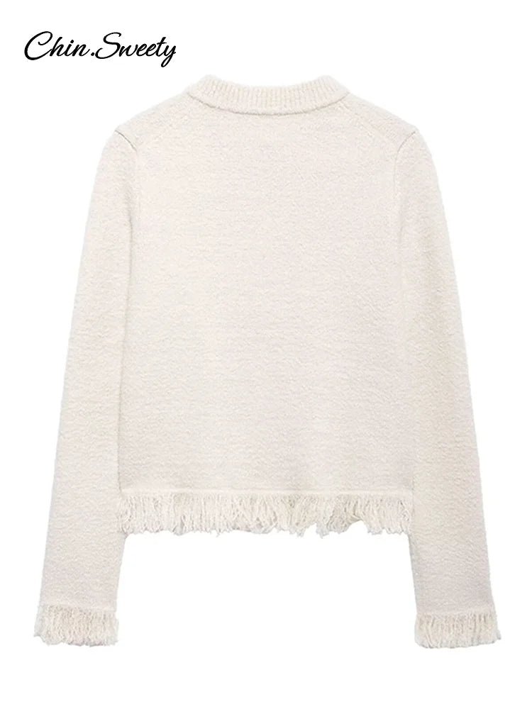 Conjunto de falda de punto con borlas de moda para mujer, cárdigan de manga larga con cuello redondo y hebilla de lazo, suéter y minifalda, nuevo conjunto a juego.