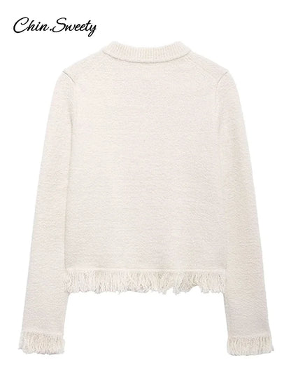 Conjunto de falda de punto con borlas de moda para mujer, cárdigan de manga larga con cuello redondo y hebilla de lazo, suéter y minifalda, nuevo conjunto a juego.
