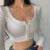 Blusas y tops de mujer con escote en V, manga larga y bajo ajustado, cárdigan de color liso con abertura en el ombligo.