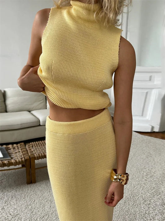 Conjunto elegante de dos piezas de punto: vestido largo, suéter acanalado y falda larga de patchwork suelta.