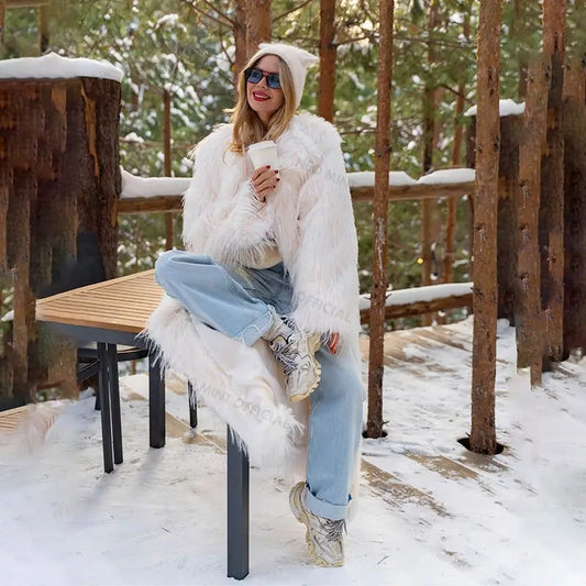 Abrigo largo de piel de pavo ecológico para mujer, chaqueta de piel sintética con borlas de lujo para invierno, abrigo grueso y cálido y esponjoso.