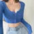 Blusas y tops de mujer con escote en V, manga larga y bajo ajustado, cárdigan de color liso con abertura en el ombligo.