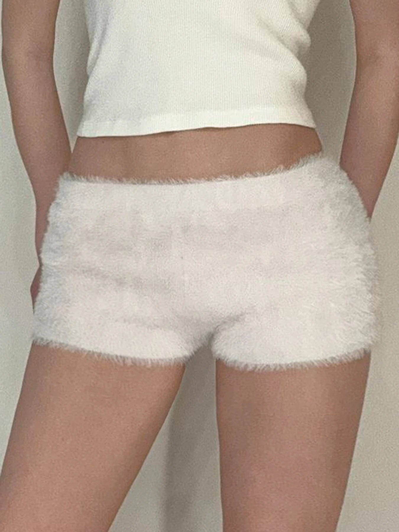 Pantalones cortos de piel sintética, suaves, sencillos y modernos para mujer, a la moda, elegantes, cálidos y lisos.