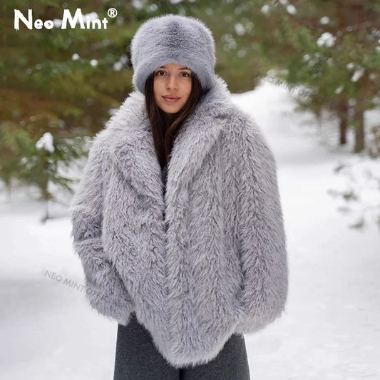 Chaqueta larga de peluche con cuello de solapa exclusiva de invierno para mujer, abrigo elegante de marca a la moda, abrigos de piel sintética acolchados y acogedores, ropa de abrigo