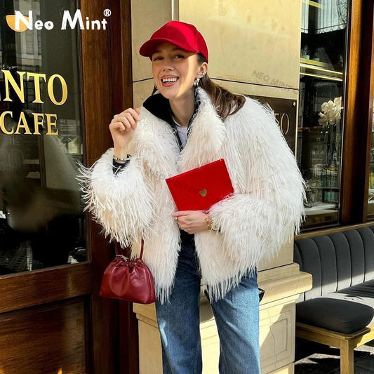 Abrigo de piel sintética esponjoso de invierno para mujer, chaqueta de piel de pavo peluda con borlas de marca de lujo, abrigo holgado para uso diario