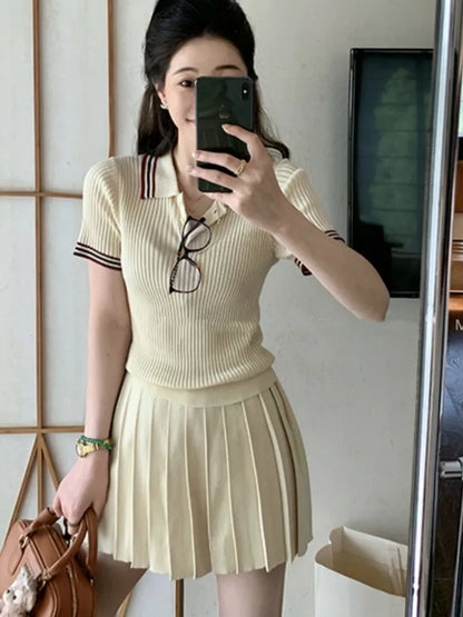 Conjunto de falda de punto de dos piezas para mujer, top de manga corta con cuello vuelto y minifalda plisada, moda coreana, otoño