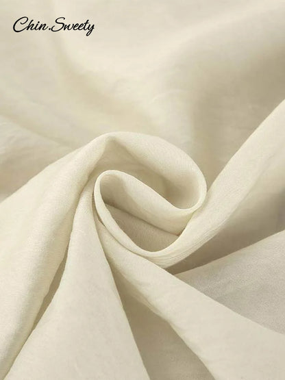 Conjunto de 2 piezas de pantalones cortos holgados con volantes para mujer, cuello en V, camisas caladas, pantalones cortos de pierna ancha, traje blanco para primavera y verano 2025.