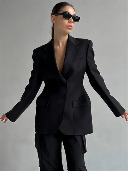 Traje de solapa negra para mujer, abrigo elegante de manga larga con bolsillos y retazos, blazer de cintura alta para otoño 2025