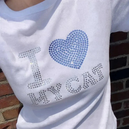Camiseta de manga corta de verano estilo europeo y americano con parte superior de diamante caliente con letras, camiseta con interior ajustado para mujer