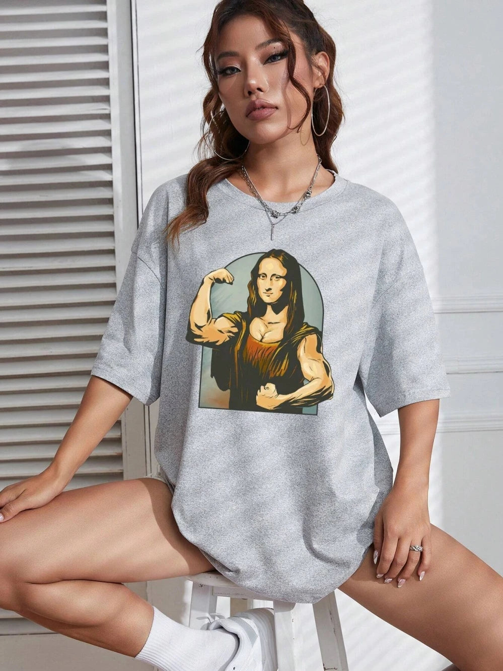 Camiseta holgada informal de algodón de manga corta con estampado de "Haciendo bromas a la Mona Lisa" para mujer