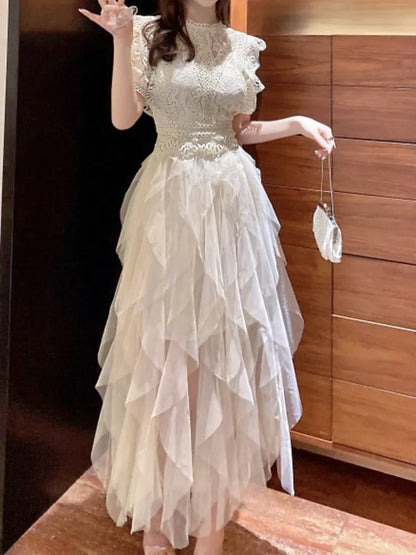 Vestido coreano de encaje con cuello redondo y retazos calados, elegante vestido blanco de malla irregular para mujer, primavera-verano 2025, A7893