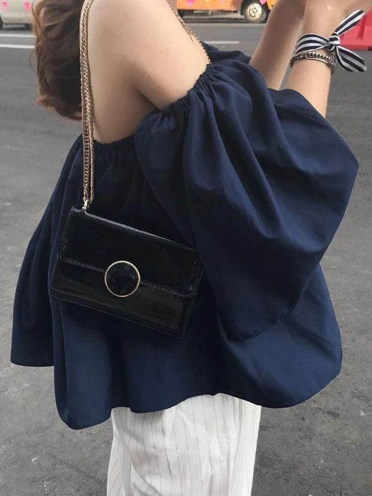 Blusas de playa con hombros descubiertos para jóvenes, blusas de moda coreana con mangas abullonadas, camisetas elegantes de verano Dongdaemun sin espalda, nuevas