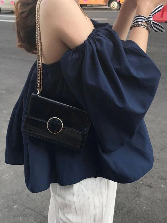 Blusas de playa con hombros descubiertos para jóvenes, blusas de moda coreana con mangas abullonadas, camisetas elegantes de verano Dongdaemun sin espalda, nuevas
