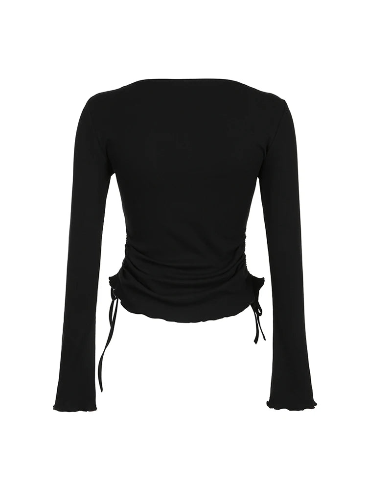 Camiseta básica de manga larga ajustada con cuello redondo y canalé liso negro para mujer, con fruncido lateral y cordones, elegante y sencilla.