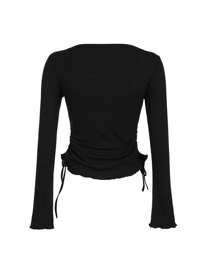 Camiseta básica de manga larga ajustada con cuello redondo y canalé liso negro para mujer, con fruncido lateral y cordones, elegante y sencilla.