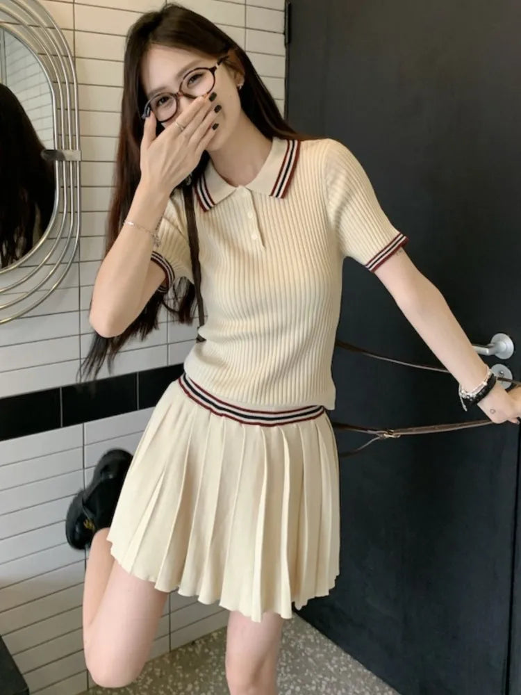 Conjunto de falda de punto de dos piezas para mujer, top de manga corta con cuello vuelto y minifalda plisada, moda coreana, otoño