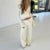 Conjunto vintage de 2 piezas con cuello en V, camiseta con lazo en la cintura y pantalones con cintura elástica para mujer, conjunto de salón de moda de otoño, top corto de manga larga