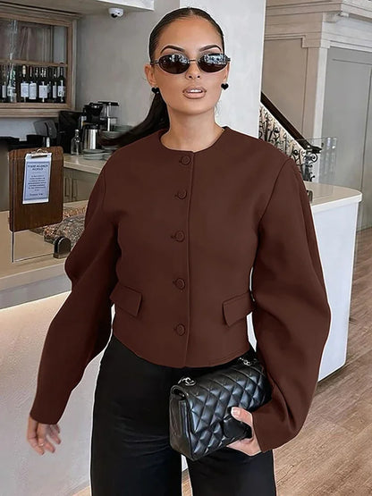 Conjunto de dos piezas de falda y cárdigan de moda para mujer, top de manga larga con botones, minifalda ajustada de color liso, conjunto elegante a juego para otoño e invierno.