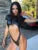 Body sexy de PU, lencería negra, top para mujer, atuendo rave, cuerpo femenino de manga corta, ahuecado, de una pieza, lencería sexy para mujer