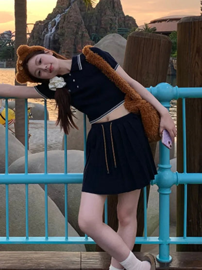 Conjunto informal de dos piezas de punto para otoño, falda corta plisada con top corto de manga corta para mujer, conjunto de tejido de moda coreana, nuevo