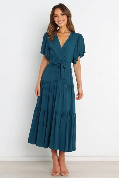 Vestidos largos con volantes de color liso de moda para mujer, sexys, con escote en V y mangas con volantes, vestido elegante con temperamento ahuecado para mujer, novedad de verano 2025