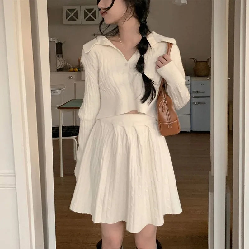 Conjunto de dos piezas de moda coreana para mujer, jersey con cuello vuelto, top corto, minifalda, traje informal liso, prendas de punto nuevas para otoño