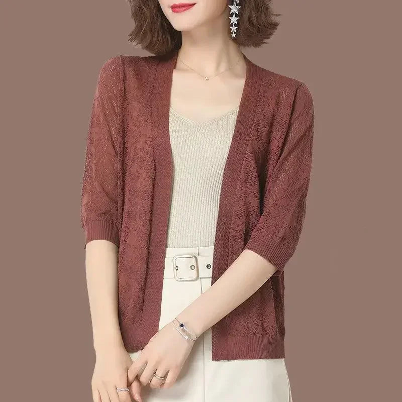 Suéter tipo cárdigan de encaje calado sexy con protección solar para mujer, suéter de punto holgado y ancho con aire acondicionado, sección delgada para primavera y otoño.